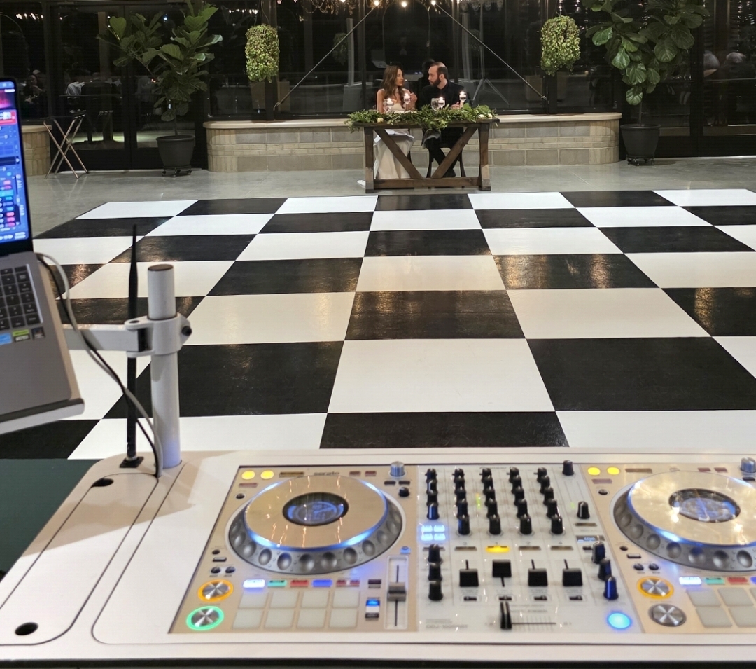 DJ View of Dance floor - See how connected the DJ is to the moment - Couple sweet heart table in background - Consevatory of Evergreen Wedding Venue - Indianapolis, Indiana Zionsville